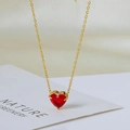 Elegant gold-tone heart necklace featuring a faceted red gemstone pendant for women - Gold with Red Rhinestone
