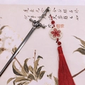 Vintage silver sword hairpin with red tassel and gold floral details in traditional style - Sword Tassel-Ancient Silver Red