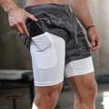 Detail of grey camo double-layer shorts featuring a hidden inner phone pocket for workouts - M / White Liner Grey Camo