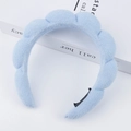 Thick light blue padded cloud headband with a twisted braided texture for face washing - Sky Blue