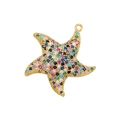 Detailed macro view of gold-plated star pendant with multi-colored cubic zirconia stones - Gold with Multicolor Zircon