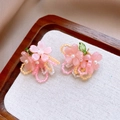Detailed macro view of pink floral asymmetric earrings with resin petals and pearl beads - 53# Silver Needle - Pink