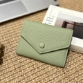 Slim tri-fold leather wallet for women in pale green with litchi texture finish - Mint Green