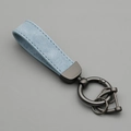 Light blue faux suede car keychain with dark grey metal horseshoe buckle and ring - Pale Blue/Gun Grey