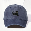 Close-up of the black cat embroidery with yellow eyes on a navy washed denim baseball cap - One Size / Navy Blue