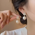 Close-up of elegant gold square diamond stud earrings with large white pearls for women - Square Pearl (A1413 Gold)