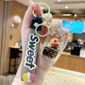 Capybara keychain with floating piglet in strawberry bottle and sweet grey strap - Capybara Holding Strawberry - Drifting Bottle