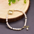 18k gold plated four-leaf clover bracelet featuring natural white pearls and crystal inlay - Rhinestone Embellishment (Clover Style) / Cross Crystal Pendant Freshwater Pearl Bracelet