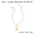 Detail view of gold layered necklace with pearl starfish and shell charm measurements - Double-layer Shell White NC25Y0011