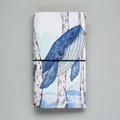 Traveler's notebook with marine wizard whale illustration and black elastic band - Bathed in Art