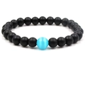 Matte black stone beaded bracelet featuring a bright blue cat eye center bead charm - Matte Black + Lake Blue Cat's Eye