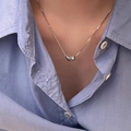 Minimalist S925 silver bean pendant necklace in rose gold finish worn by model - Minimalist Bean Pendant Style (XL1764-1)