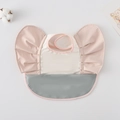 Waterproof baby wing bib in pink and grey with large food catcher pocket and frill sleeves - Wings - Creamy White And Light Pink / One Size