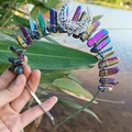 Detail of silver filigree crescent moon and rainbow aura crystals on boho headband - Multicolor