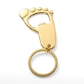 Creative foot-shaped metal bottle opener keychain in a polished golden finish - Gold