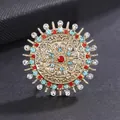 Vintage gold sunburst brooch featuring vibrant red, blue and white crystals for women - KC Gold, Multicolored Radial
