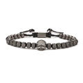Close-up of black beaded punk bracelet featuring a micro-paved crystal skull and adjustable cord - Black Skull