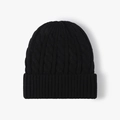 Classic black cable-knit winter beanie featuring a warm fold-over cuff for outdoor protection - Black
