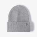 Gray knitted beanie with golden M badge and thick warm texture for winter style - One Size / Light Gray