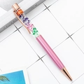 Elegant rose gold and pink ballpoint pen filled with colorful dried flowers in crystal casing - Pale Purple