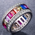 Macro shot of silver ring with colorful rectangular gems and side white stones - US 6 / Colorful Zirconia