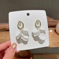Elegant gold metal tassel earrings with white petal charms and zircon stones - Petal Zirconia Drop / Gold
