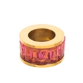 Macro detail of gold ring featuring a row of vibrant pink rectangular-cut zircon stones - Rose Pink Ring