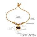 Detail showing gold adjustable heart enamel bracelet dimensions and zircon bead accents - Gold