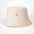 Detail of embroidered orange heart on cream cotton canvas bucket hat for women - M (56-58cm) / Beige