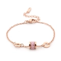 Bracelet en acier titane rose doré avec cristal rose et breloques chiffres romains - Rose
