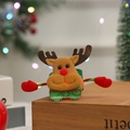 Close-up of reindeer sequin slap bracelet for Christmas gifts on festive wooden base - Sequin Glowing Reindeer