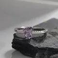 Macro shot of oval purple amethyst ring with pavé-set zircons on silver band - Elegant Embellished Style (LR307)