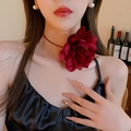 Detailed view of the oversized burgundy fabric flower choker worn by a fashion model - 17# Wine Red Large 3D Fabric Flower Choker
