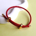 Adjustable red leather cord bracelet with elegant gold figure-eight infinity clasp - Red