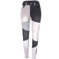 Dettaglio dei jeans skinny elasticizzati patchwork nei colori nero, grigio e bianco - Nero