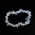 Macro shot of irregular milky white translucent agate crystal beaded bracelet on black base - Opal