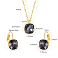 Detail view of gold-plated stainless steel jewelry set with dark gray square crystals - Gold-Mineral Black Crystal