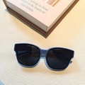 Kids polarized sunglasses with dark blue silicone frame and grey lenses on stone background - Lake Blue