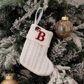White knitted Christmas stocking with red letter B embroidery hanging on a tree - Embroidered Knitted Small Sock White B
