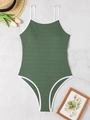 Flat lay of olive green one-piece swimsuit with white trim and ribbed wavy texture - S / Green