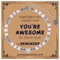 Detail of 4mm pink beaded bracelet with stainless steel heart pendant on a gift card - Rose Quartz
