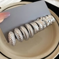 Detail of silver drop and C-shaped earrings with textured ribbing on a display card - Silver Needle - Silver (10 Pieces Set)