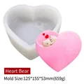 Silicone heart bear candle mold with white translucent texture and finished 3D pink shape - Heart Bear