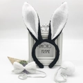 Detailed close-up of plush bunny ear headband, bow tie, and tail costume accessories set - Black & White Plush