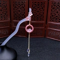 Classical acetate hair stick with pink cherry blossoms and gold tassels on a stand - Pink