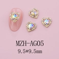 Close-up of 9.5mm aurora heart nail charms with golden hollow lace frames and rhinestones - Heaven's Light Style(AG05)