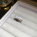 Macro view of 18k gold plated double-layer crisscross ring with pavé zircon details - Silver