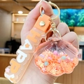 Shell floating bottle keychain with orange glitter and HAPPY silicone strap charm - Orange