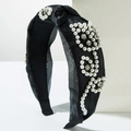 Detail of black mesh headband featuring elegant white pearls and crystal flower patterns - Black