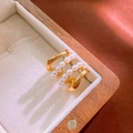 Detail view of gold layered ring with pearls in a luxury wooden velvet jewelry box - Gold (925 Sterling Silver Earring Post)